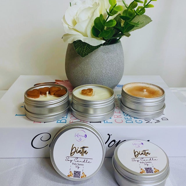 Mini handmade soy wax candles inviting new customers to discover and experience our variety of unique natural candles. Fragrance: Palo Santo Wood